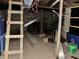 Unfinished basement with a ladder and various materials at 3480 S Us Highway 31, Franklin, IN 46131