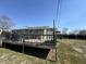 Spacious wooden deck with backyard view at 3480 S Us Highway 31, Franklin, IN 46131