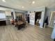 Open kitchen and dining area with wooden table at 3480 S Us Highway 31, Franklin, IN 46131