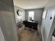 Small room with piano, exercise equipment, and gray walls at 3480 S Us Highway 31, Franklin, IN 46131