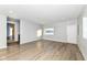 Spacious basement with light wood flooring and large window at 4305 Five Points Rd, Indianapolis, IN 46239
