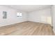 Finished basement with neutral walls and vinyl flooring at 4305 Five Points Rd, Indianapolis, IN 46239