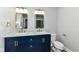 Modern bathroom with double vanity and updated fixtures at 4305 Five Points Rd, Indianapolis, IN 46239