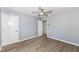 Spacious bedroom with ceiling fan and ample closet space at 4305 Five Points Rd, Indianapolis, IN 46239