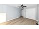 Bright bedroom with ceiling fan and double door closet at 4305 Five Points Rd, Indianapolis, IN 46239
