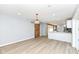 Open concept dining area with hardwood floors and barn door at 4305 Five Points Rd, Indianapolis, IN 46239
