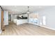 Spacious dining area features hardwood floors and access to the kitchen and backyard at 4305 Five Points Rd, Indianapolis, IN 46239