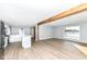 Spacious living room with hardwood floors and large window at 4305 Five Points Rd, Indianapolis, IN 46239