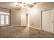 Spacious bedroom with carpet and double doors at 450 E Ohio St # 106, Indianapolis, IN 46204