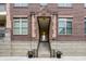 Main entrance with steps leading to the building at 450 E Ohio St # 106, Indianapolis, IN 46204