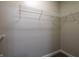 Walk-in closet with wire shelving providing ample storage at 450 E Ohio St # 106, Indianapolis, IN 46204