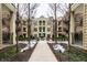 Shared courtyard with walking path and building view at 450 E Ohio St # 106, Indianapolis, IN 46204