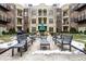 Common area with seating and a covered fountain at 450 E Ohio St # 106, Indianapolis, IN 46204