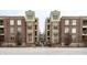 Brick building with multiple units and gated entrance at 450 E Ohio St # 106, Indianapolis, IN 46204