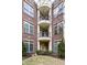 Brick building with multiple balconies and a courtyard at 450 E Ohio St # 106, Indianapolis, IN 46204