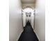 Residential hallway with carpeted floors at 450 E Ohio St # 106, Indianapolis, IN 46204
