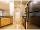 Kitchen with granite countertops and black appliances at 450 E Ohio St # 106, Indianapolis, IN 46204