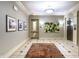 Elegant lobby with artwork and elevator access at 450 E Ohio St # 106, Indianapolis, IN 46204