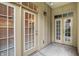 Private patio with double doors leading to the outdoors at 450 E Ohio St # 106, Indianapolis, IN 46204