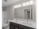 Bathroom featuring dual vanity, toilet and shower/tub combo with neutral decor at 5511 Sienna Ct, Brownsburg, IN 46112