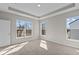Bedroom featuring bright windows, neutral walls, and plush carpeting at 5511 Sienna Ct, Brownsburg, IN 46112