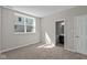 Bedroom with an en suite bathroom featuring plush carpeting and natural light at 5511 Sienna Ct, Brownsburg, IN 46112