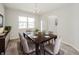 Elegant dining room with wood table and six chairs at 6250 Bales Dr, Plainfield, IN 46168