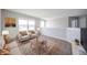 Cozy living room with hardwood floors and plenty of natural light at 6250 Bales Dr, Plainfield, IN 46168
