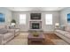 Living room with fireplace and two comfortable sofas at 6250 Bales Dr, Plainfield, IN 46168