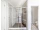Modern shower with glass enclosure and tiled walls at 6250 Bales Dr, Plainfield, IN 46168