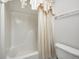 Clean bathroom with tub and shower curtain at 7259 Registry Dr, Indianapolis, IN 46217