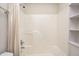 Bathroom with shower/tub and shelving at 7259 Registry Dr, Indianapolis, IN 46217