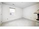 Simple bedroom with window and neutral carpeting at 7259 Registry Dr, Indianapolis, IN 46217