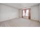 Bright bedroom with neutral carpeting and window at 7259 Registry Dr, Indianapolis, IN 46217