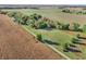 Aerial view of property with long driveway and surrounding farmland at 740 S County Road 775 W, Coatesville, IN 46121