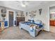 Spacious bedroom with NY Yankees decor and adjacent bathroom at 740 S County Road 775 W, Coatesville, IN 46121