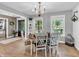 Bright dining room with hardwood floors and views of the backyard at 740 S County Road 775 W, Coatesville, IN 46121