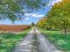 Long gravel driveway leading to charming house at 740 S County Road 775 W, Coatesville, IN 46121