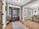 Elegant entryway with a statement door and tiled flooring at 740 S County Road 775 W, Coatesville, IN 46121