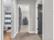 Hallway with doors to bedrooms and bathroom at 740 S County Road 775 W, Coatesville, IN 46121