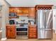 Modern kitchen with stainless steel appliances and ample wood cabinetry at 740 S County Road 775 W, Coatesville, IN 46121