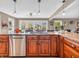 Kitchen island with granite countertops and stainless steel appliances at 740 S County Road 775 W, Coatesville, IN 46121