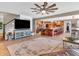 Open concept kitchen with island, stainless steel appliances, and hardwood floors at 740 S County Road 775 W, Coatesville, IN 46121