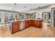 L-shaped kitchen island with granite countertops and stainless steel dishwasher at 740 S County Road 775 W, Coatesville, IN 46121