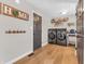 Laundry room with washer, dryer, and storage shelves at 740 S County Road 775 W, Coatesville, IN 46121