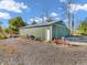 Detached green metal outbuilding with storage space at 740 S County Road 775 W, Coatesville, IN 46121