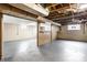 Unfinished basement offering ample storage space at 8415 E 10Th St, Indianapolis, IN 46219
