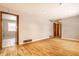 Open concept living room with hardwood floors at 8415 E 10Th St, Indianapolis, IN 46219