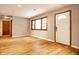Spacious living area featuring hardwood floors at 8415 E 10Th St, Indianapolis, IN 46219