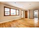 Hardwood floor living room with an open floor plan at 8415 E 10Th St, Indianapolis, IN 46219